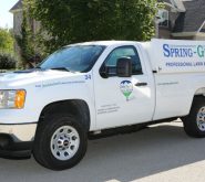 spring-green lawn care truck