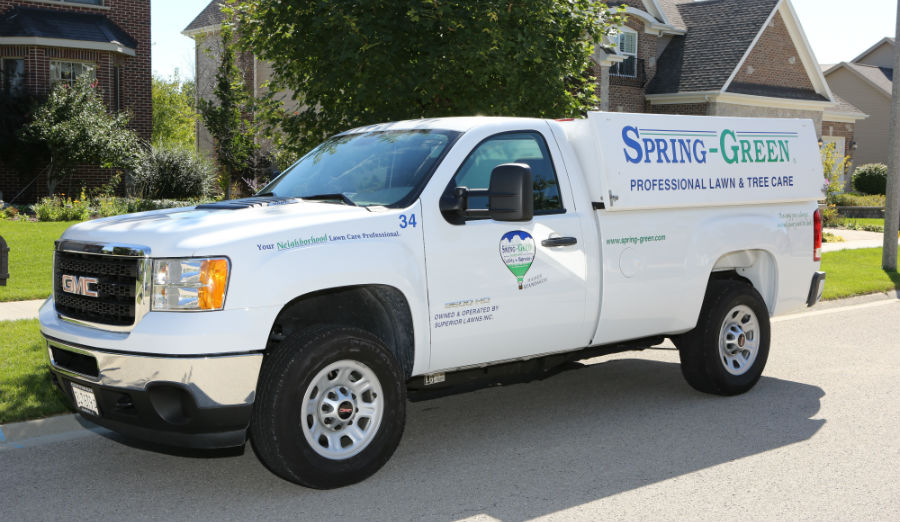 spring-green lawn care truck